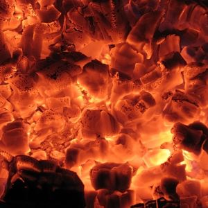 Glowing embers in a fireplace